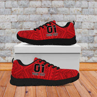 Red lace-up football sneakers with black sole, '01' detail and crest patch.
