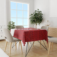 Red football tablecloth with geometric pattern on dining table in bright room