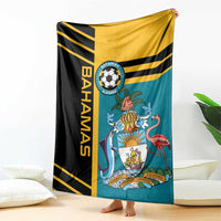 Football blanket with teal and black color blocks, yellow stripes, team crest and flamingo
