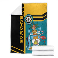 Folded football blanket set in teal, black and yellow with central team crest