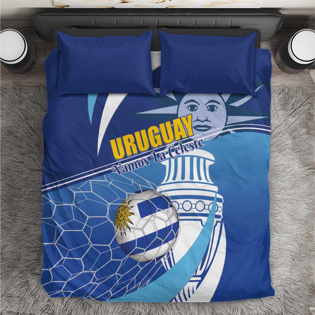 Blue duvet and matching pillows with Uruguay face, text, and soccer ball print