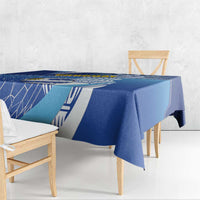 Blue football tablecloth with white geometric lines and diagonal Uruguay-style stripe