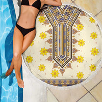 Round beach blanket on poolside, cream fabric with yellow flowers and blue-brown center motif