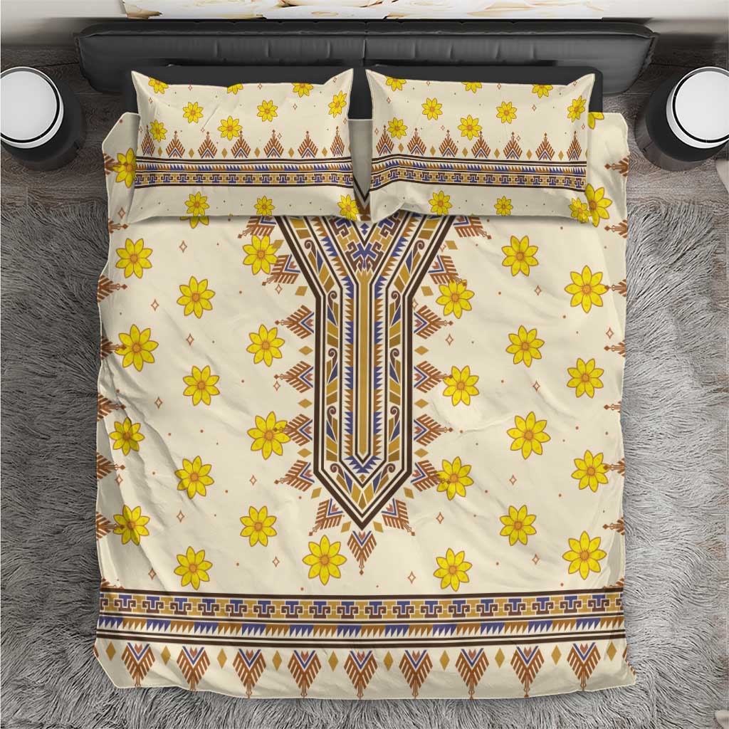 Yellow floral and geometric patterned bedding set with two matching pillowcases.