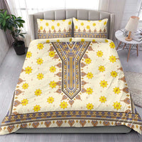 Yellow floral and geometric bedding set with two pillowcases, shown on a bed.