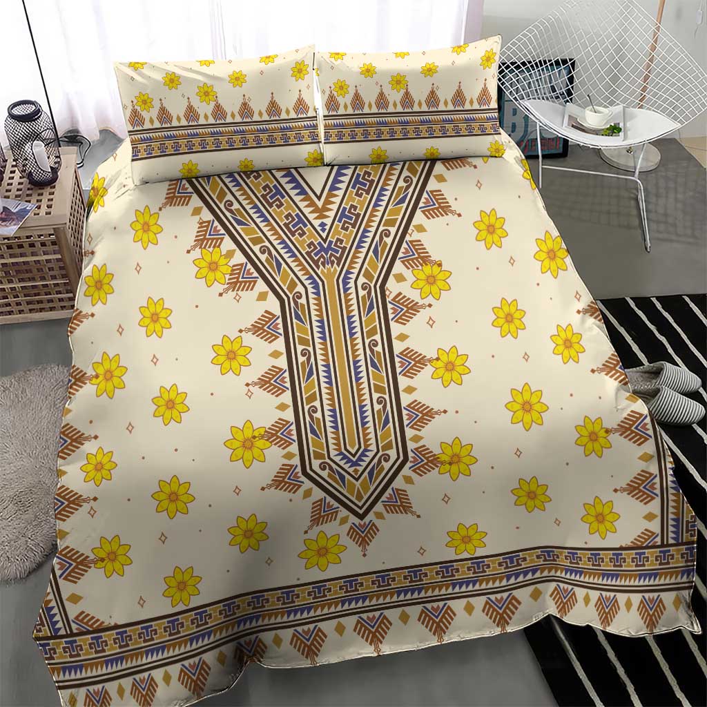 Yellow floral and geometric bedding set featuring a central V-shaped medallion design.