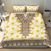 Yellow floral and geometric bedding set with two pillowcases and bold border trim.