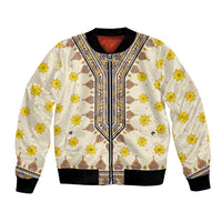 Unisex bomber jacket with cream base, yellow flower print, geometric trim, ribbed cuffs and hem