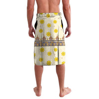 Men's wrap skirt with cream, yellow flower print, blue trim, and stitched hem