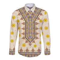 Cream long-sleeve dashiki button shirt with yellow flowers and blue geometric center
