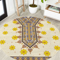 Round beige carpet with blue geometric border and yellow flower pattern