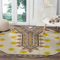 Round beige carpet with blue-and-brown border and scattered yellow blossoms