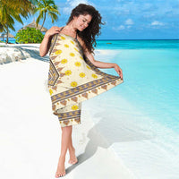 Yellow floral geometric sarong with V-shaped central border pattern