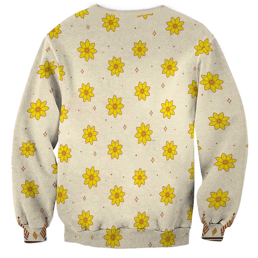 Unisex sweatshirt back with repeating yellow flowers and small geometric motifs