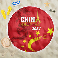 Round red beach blanket with fringe, China 2024 dragon, stars, and curved flame design