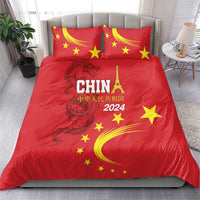 Red bedding set with two pillowcases; China 2024, yellow stars, and dragon motif