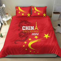 Red bedding set with China 2024, yellow stars, and dragon emblem on duvet