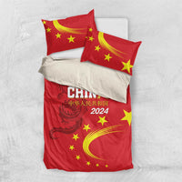 Red bedding set with pillowcases and duvet; China 2024 with yellow stars and dragon