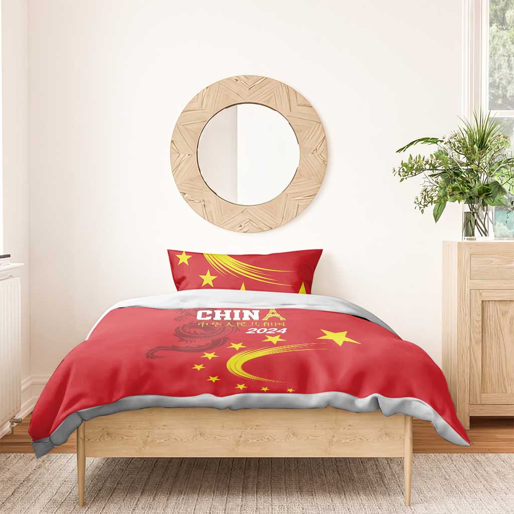 Red duvet cover with China 2024, yellow stars, and dragon emblem; matching red pillowcase
