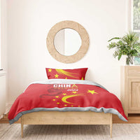 Red duvet cover with China 2024, yellow stars, and dragon emblem; matching red pillowcase