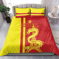 Red and yellow bedding set with CHINA text, dragon, and Eiffel Tower graphic