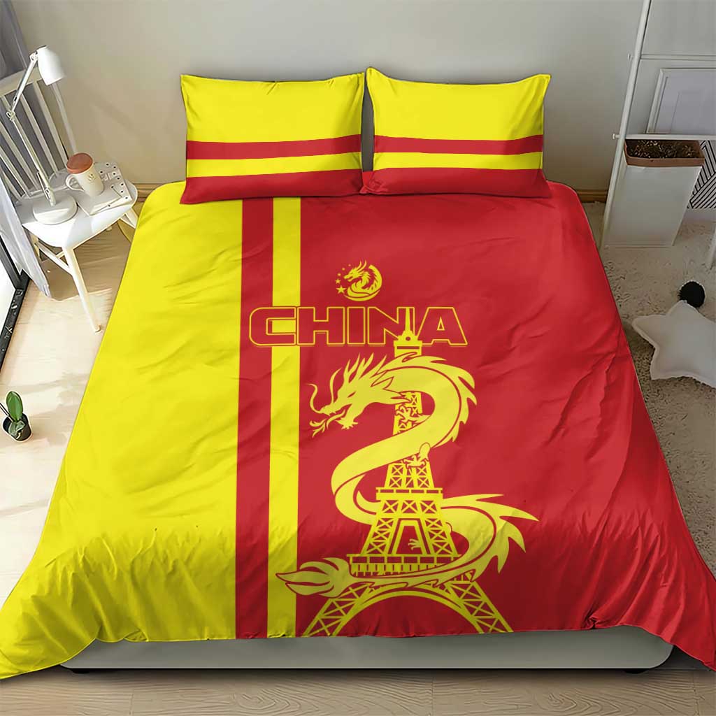 Red and yellow duvet and pillow set with CHINA text, dragon, and Eiffel Tower motif