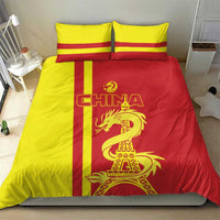 Red and yellow duvet and pillow set with CHINA text, dragon, and Eiffel Tower motif