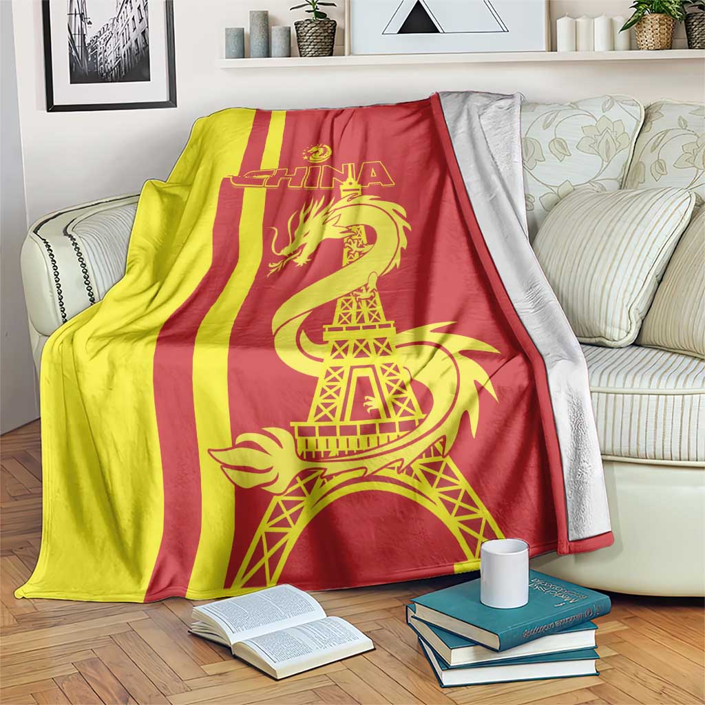 China-themed blanket with red and yellow stripes, golden dragon, Eiffel Tower graphic