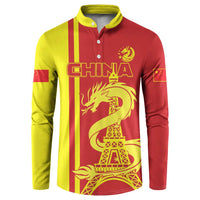 Red/yellow long-sleeve button polo with China graphic, dragon and Eiffel Tower