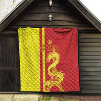 Red and yellow China-themed quilt on wall, dragon and Eiffel Tower print, diamond quilting
