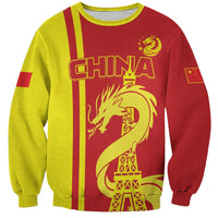 Unisex China sweatshirt, red and lime panels, front dragon with Eiffel tower graphic