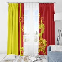 Red and yellow window curtain panels with gold dragon and Eiffel Tower print on rod