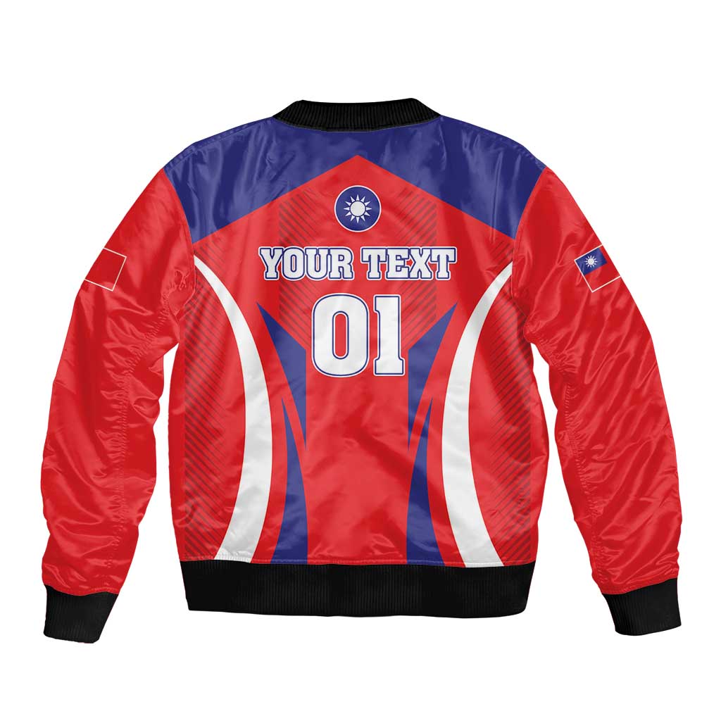 Back of red and blue bomber jacket with black ribbed hem, sports flag graphic and text