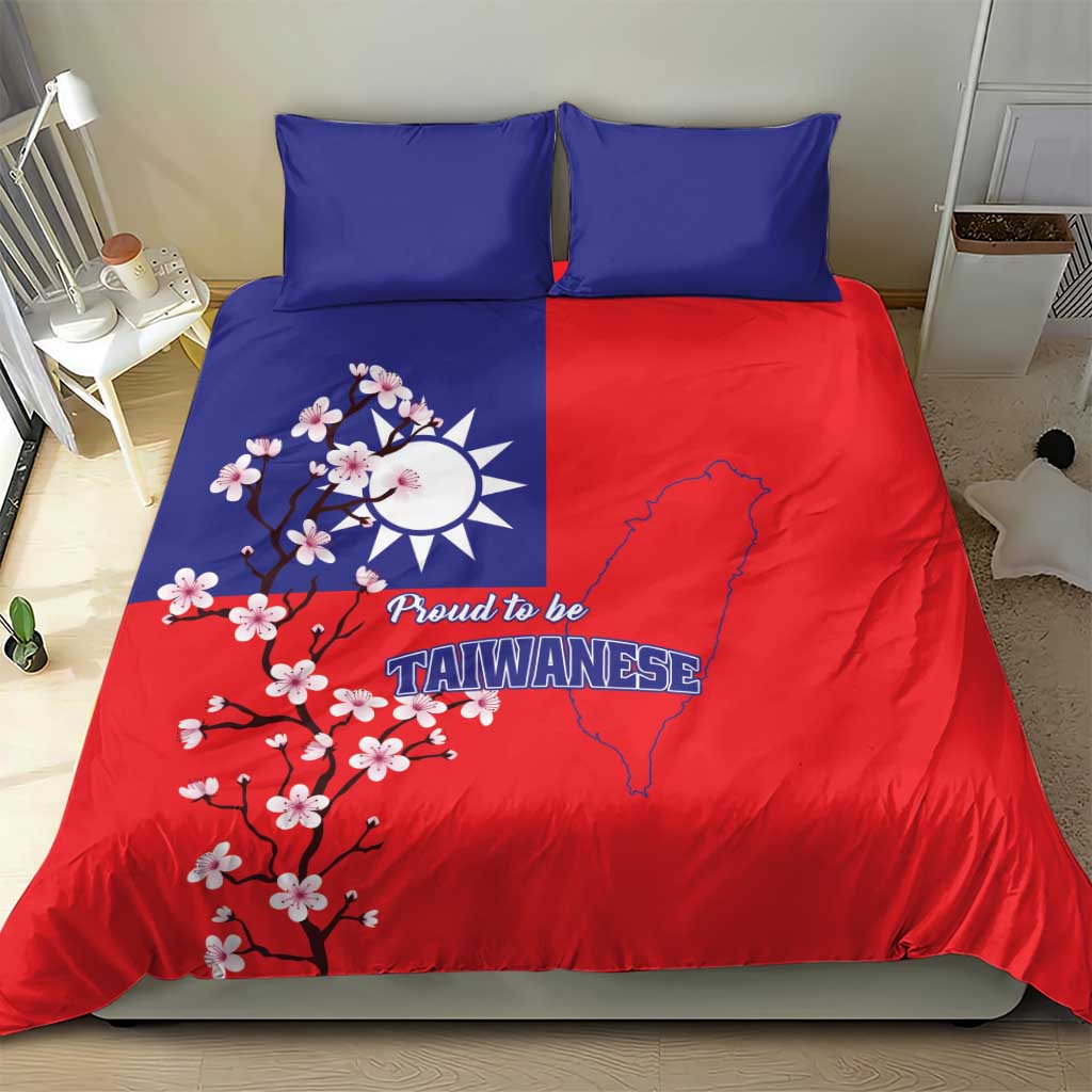 Red comforter with plum blossom branches, Taiwan map, and two blue pillowcases