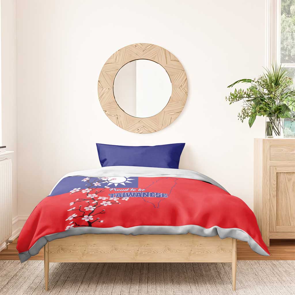 Red and blue bedding set with Taiwan map, plum blossom flowers, and two pillowcases