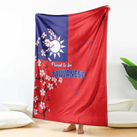 Red and blue Taiwan flag blanket hanging, with plum blossoms and Taiwan map emblem