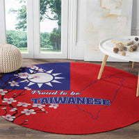 Red round rug with blue Taiwan map, 'Proud to be Taiwanese' text, and cherry blossom prints.