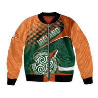 Unisex bomber jacket with orange sleeves, green front panel, Ireland and shamrock graphic