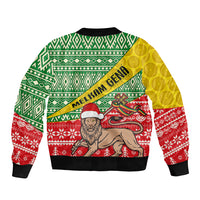 Unisex bomber jacket with diagonal 'Melkam Gena' text, lion graphic, green/yellow/red