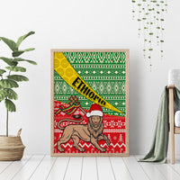 Wooden-framed canvas wall art featuring lion in Santa hat, Ethiopia text, and green red patterns