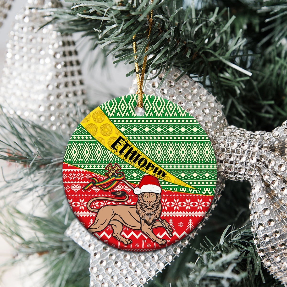Heart-shaped ceramic Christmas ornament with green red Ethiopian pattern, ETHIOPIA band, lion figure.