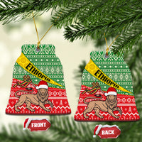 Pair of round ceramic Christmas ornaments showing front and back text, green red ETHIOPIA lion art.