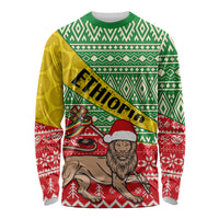 Unisex long-sleeve Christmas shirt with green, red, yellow African pattern and Melkam Gena text