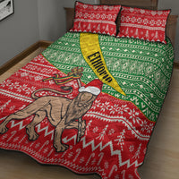 Quilt bed set on bed with red and green holiday pattern, yellow sash stripe, lion design