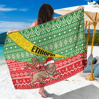 Christmas Ethiopian sarong with green, red, white geometric pattern and bearded figure