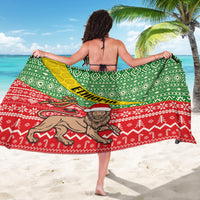 Christmas Ethiopian sarong, green and white diamond pattern with red festive border