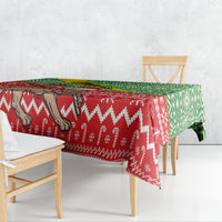 Square Christmas tablecloth in red and green with zigzag and snowflake-style motifs