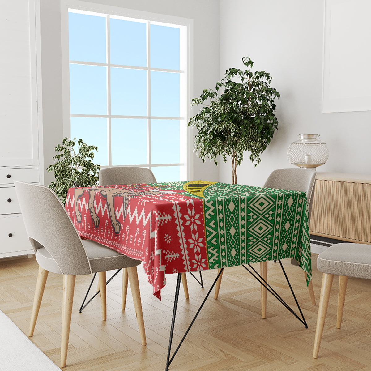 Christmas tablecloth draped on dining table, red and green tribal pattern with zigzag edges