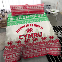 Christmas bedding set with Welsh dragon and 'CYMRU' text, red and green geometric borders