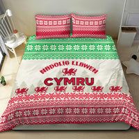 Christmas duvet set with Welsh dragon and CYMRU lettering, white base with red and green trims